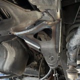 close up of a 4th gen dodge diesel trackbar bracket to replace factory bracket