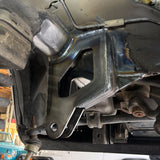 close up of a 4th gen dodge diesel trackbar bracket to replace factory bracket